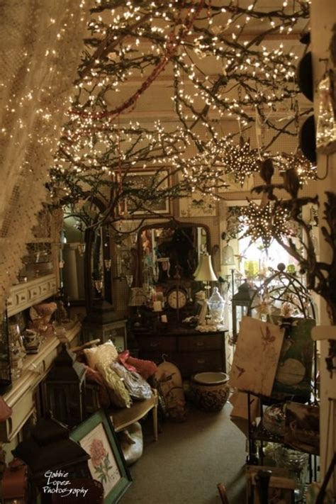 Twinkle lights in bedroom became a favorite place to spend time in the house. White lights wrapped around grapevine garland & greenery ...