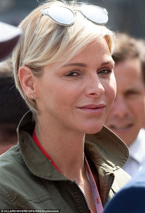 princess charlene cuts a chic figure in khaki green overalls in monaco daily mail online