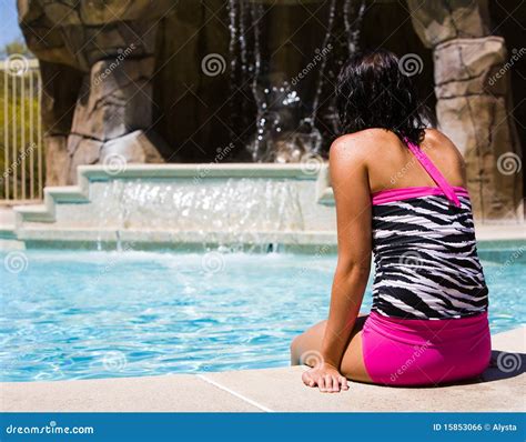 Beautiful Girl Poolside Relaxing By A Waterfall Royalty Free Stock Image CartoonDealer Com