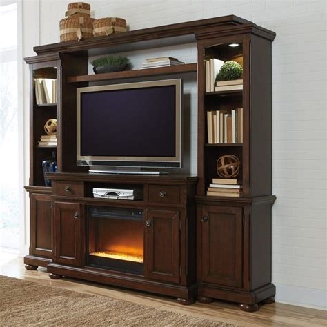 We found the entertainment center on craigslist for $100, because they got rid of their big projection screen tv (which many are doing these days). Signature Design by Ashley Furniture Porter Entertainment ...