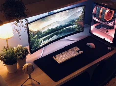 curved monitors are gimmicky. but i like how it fits here with the ...
