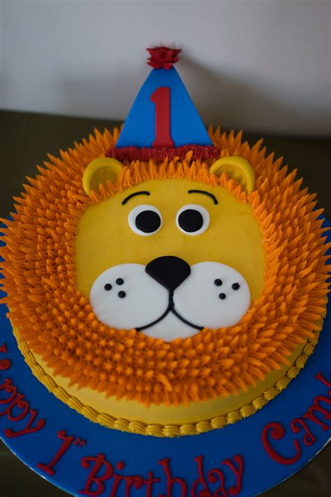 Have fun blowing out all the candles on your cake while you can still count them. Lion First Birthday Party - The Best Ideas for Kids