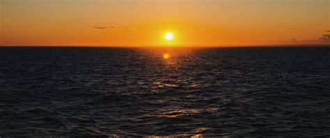Download Wallpaper 2560x1080 Sea Sunset Horizon Water Ripples Sun