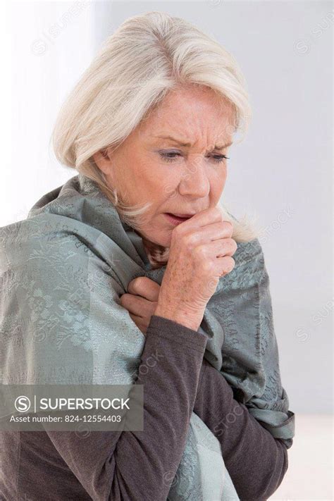 Senior Woman Coughing Superstock