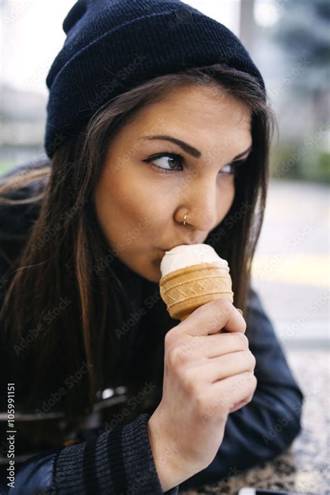 Beautiful Woman Eating Ice Cream Stock Photo Adobe Stock