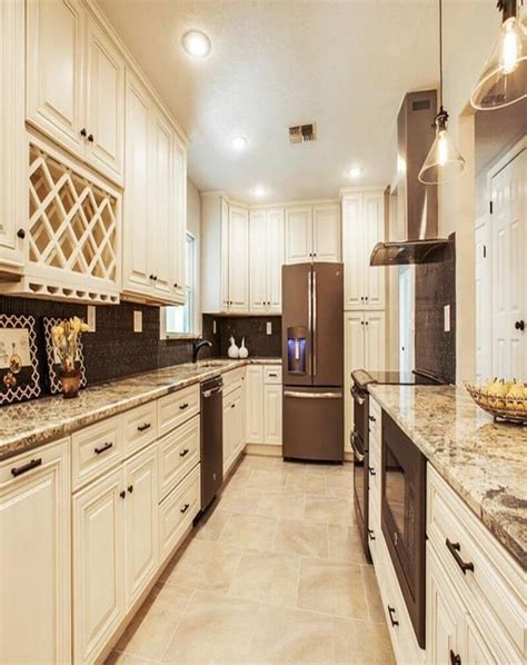 The addition of white cabinetry will keep things looking more energized. off white colors vanilla kitchen cabinets with granite ...