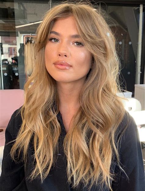 The style's precisely parted sections of hair reminded them too much of. Matilda Djerf curtain bangs Brigitte Bardot hair style with voluminous curls | Bardot hair, Long ...