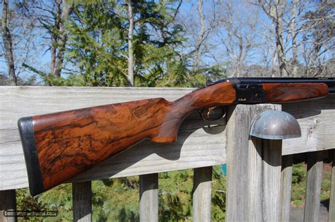 Two friends united by a passion for sports try to convince a third that sport is amazing and worth caring about. Beretta 682 Gold Greystone 12 ga. 32" Sporting bbls ...
