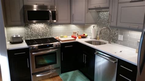 I dont have a designer. Small efficient kitchen with maple Kraftmaid cabinets in a ...