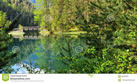 Reflection In Turquoise Lake Stock Photo Image Of Forest Forests