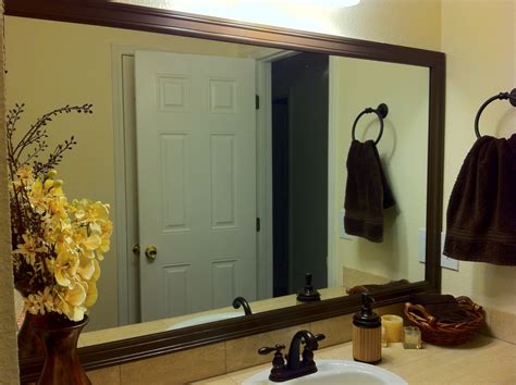 Bathrooms are a calm, reflective place frequented regularly. Miscellanea Etcetera: DIY Bathroom Mirror Frame for less ...