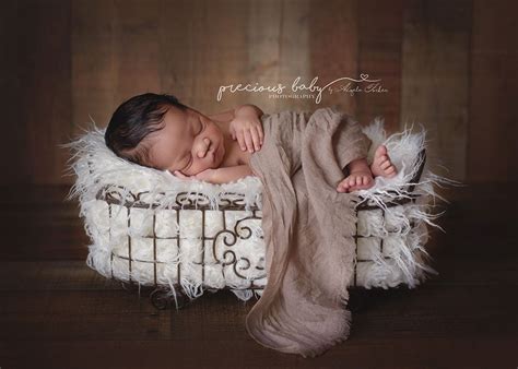 Gorgeous African American Baby Boy Sleeping On Fur In A Basket Newborn