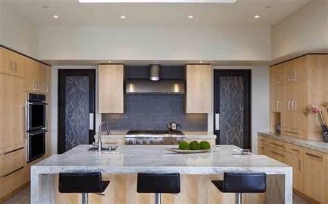 With shelves beneath the tabletop, you'll be able to hide much of your storage: 20 Kitchen Island With Seating Ideas - Home Dreamy