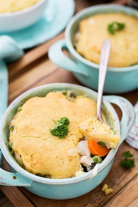Carrots, peas, and rotisserie chicken with a flavorful gravy, wrapped up in a buttery, flaky chicken pot pie crust! Gluten Free Chicken Pot Pie with Cornbread Crust Recipe
