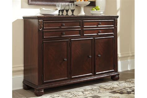 It is a heavy very sturdy piece of real furniture. Leahlyn Dining Room Buffet | Ashley Furniture HomeStore