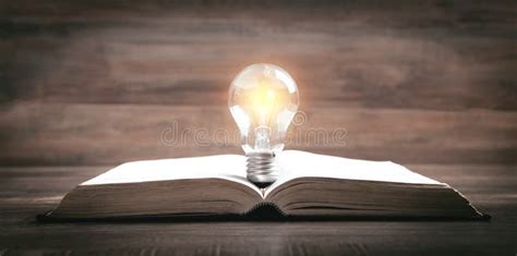Light Bulb And Book Knowledge And Wisdom Stock Photo Image Of Holy