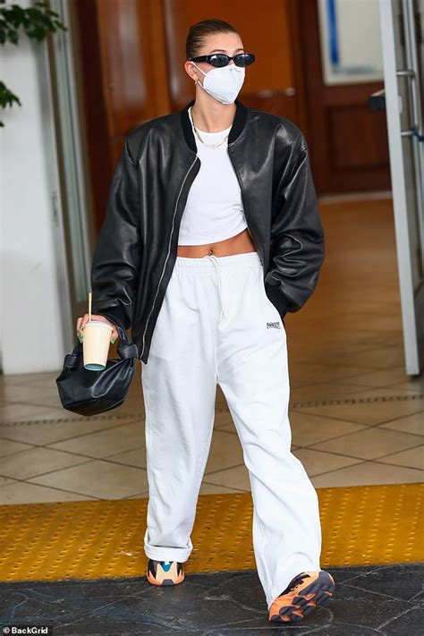 Hailey Bieber Reveals Her Washboard Abs In A White Crop Top And Leather