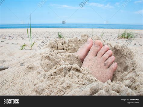 feet buried sand image and photo free trial bigstock