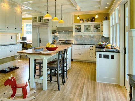 Both kitchen cabinet and island have the same countertops that are in brown and they are shiny. These 20 Stylish Kitchen Island Designs Will Have You ...