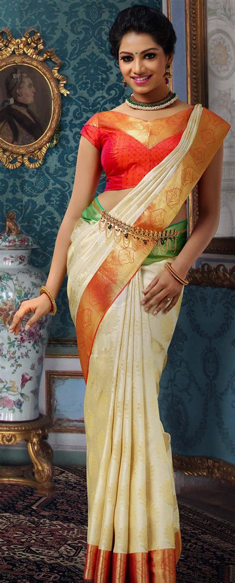 Lovely Traditional Red Green And Off White Pattu Saree Saree Models