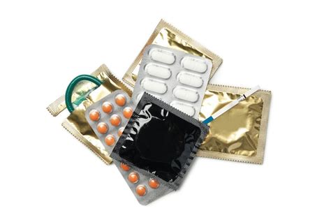 Premium Photo Pregnancy Test Condoms And Pills Isolated On White Surface
