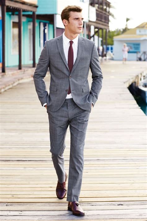 Combining gray with dark green creates a more sophisticated and mysterious look. Suit and Tie Combinations for Men | Grey suit brown shoes ...