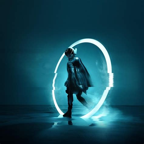 A Man Standing In Front Of A Circular Light