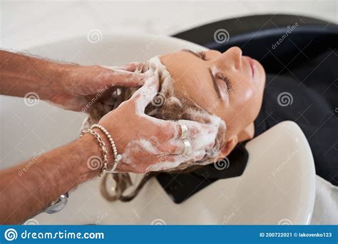 Woman Having Her Hair Washed In A Hairdressing Salon Stock Image