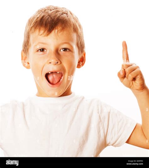 Little Cute White Boy Pointing In Studio Isolated Close Up Stock Photo