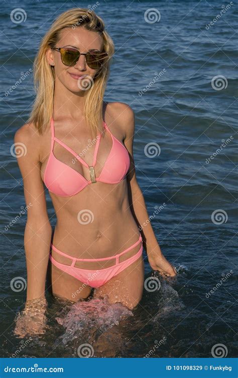 Beatiful Girl Standing On The Beach In White Bikini Stock Photo Image