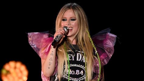Heres What Avril Lavignes Tattoos Really Mean