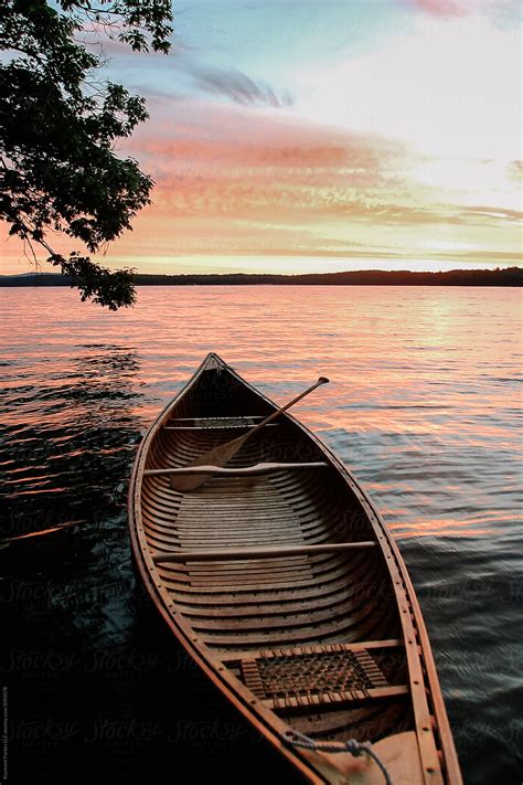 Wooden Canoe At Sunrise On Lake Nature Landscape In Maine By Stocksy