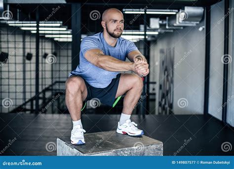 Athlete Doing Squats On A Squat Box At The Gym Guy At The Gym Working