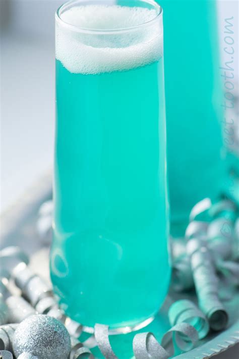 Turquoise Sip Champagne Cocktail Champagne Cocktail Blue Drinks Drinks