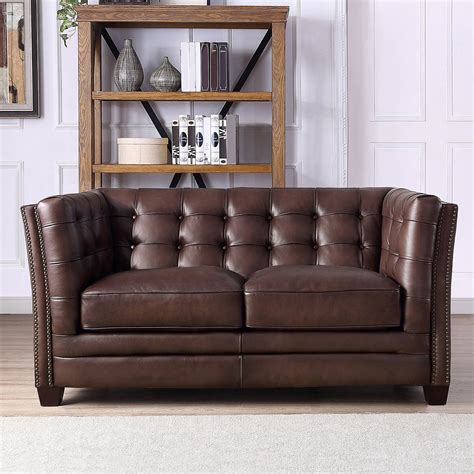 The size is a generous 47 x 35 inches with a thickness of only 0.2 inches making it relatively inconspicuous. Belmond 2 Seater Brown Leather Sofa | Costco UK | Leather ...