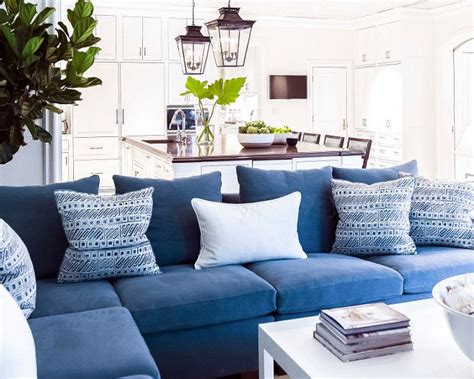 The different shades of blue work well with the white wall and the dark wood furniture. Family room with Navy Blue Sectional with blue and white ...