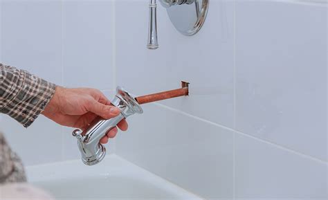 Budget yourself some time to drill holes in the surround for placement of the faucet and shower head. How to Replace a Bathtub Faucet - The Home Depot