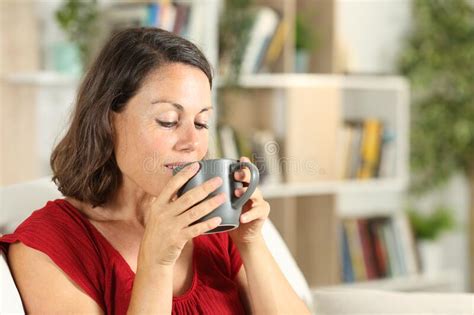 Satisfied Adult Woman Drinking Coffee At Home Stock Image Image Of Housewife Confident 191360291