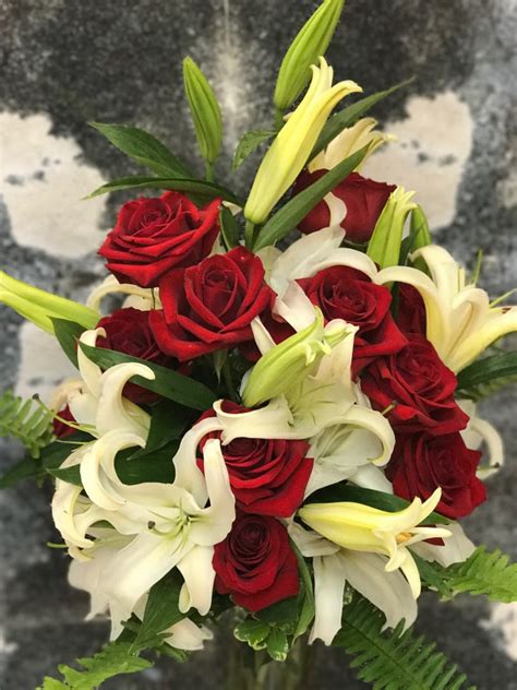 Hours may change under current circumstances Casablanca Lilies With A Dozen Red Roses in Fort ...