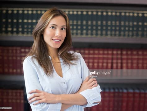 successful asian lawyer or business woman at the office with book at women lawyer women
