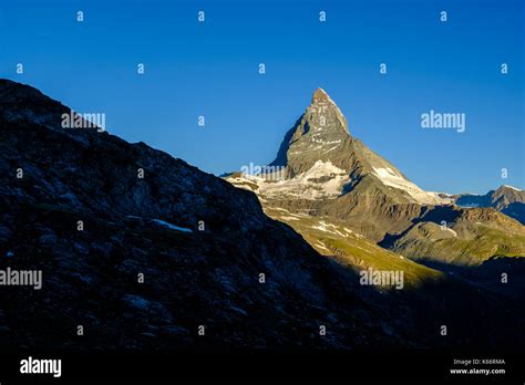 The East Face Of The Matterhorn Monte Cervino At Sunrise Stock Photo