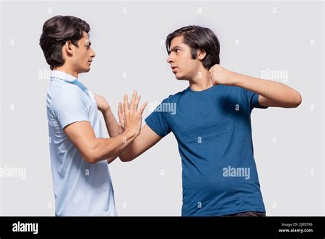 Grabbing Clothing Hi Res Stock Photography And Images Alamy