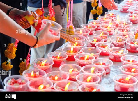 Burning Red Chinese Candle In Temple Stock Photo Alamy