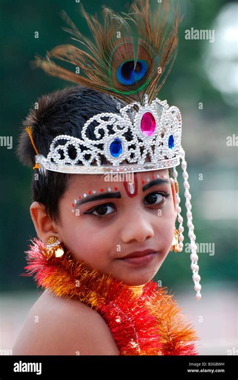 Little Krishna A Small Boy Posing As Lord Krishna In A Balagokulam
