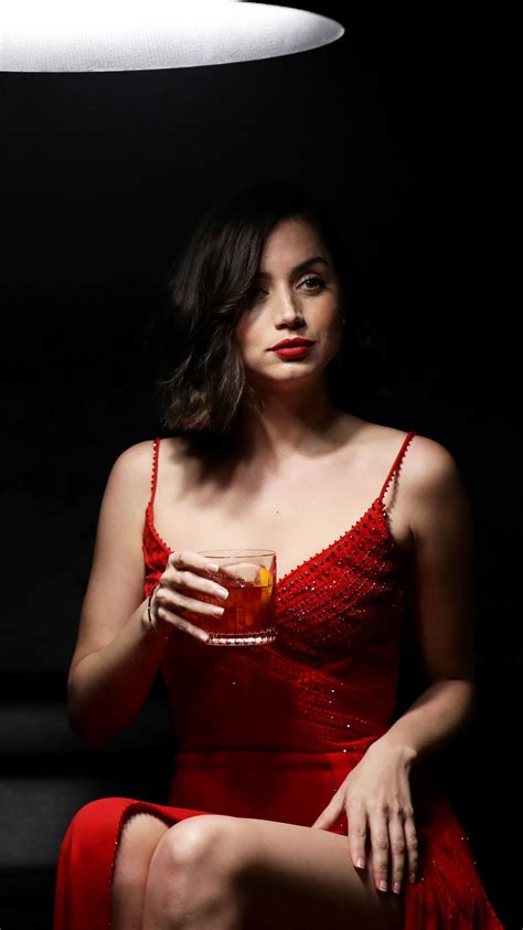 beautiful ana de armas red dress with drink 4k ultra hd mobile wallpaper