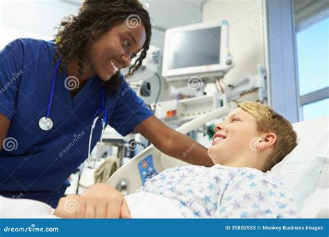 Boy Talking To Female Nurse In Emergency Room Stock Photos Image