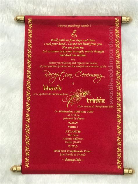 satin silk type material scroll invitation and wedding card swastik cards