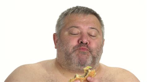 Greedy Man Eating Burger On White Background Close Up Of Fat Man
