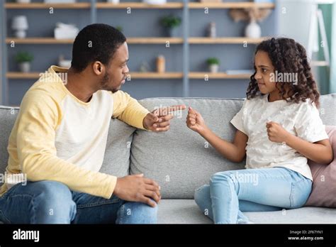 Serious Black Father Scolding His Angry Daughter Home Interior Stock
