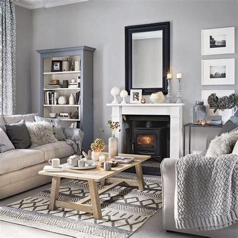 Pretty Light Grey Living Room With White Trim And Fireplace And Dark